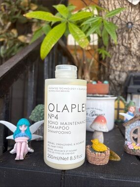 OLAPLEX No.4 Bond Maintenance Shampoo — Cream & Black Bottle